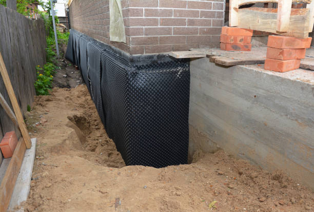 Happy homeowners after waterproofing job in Pennsburg